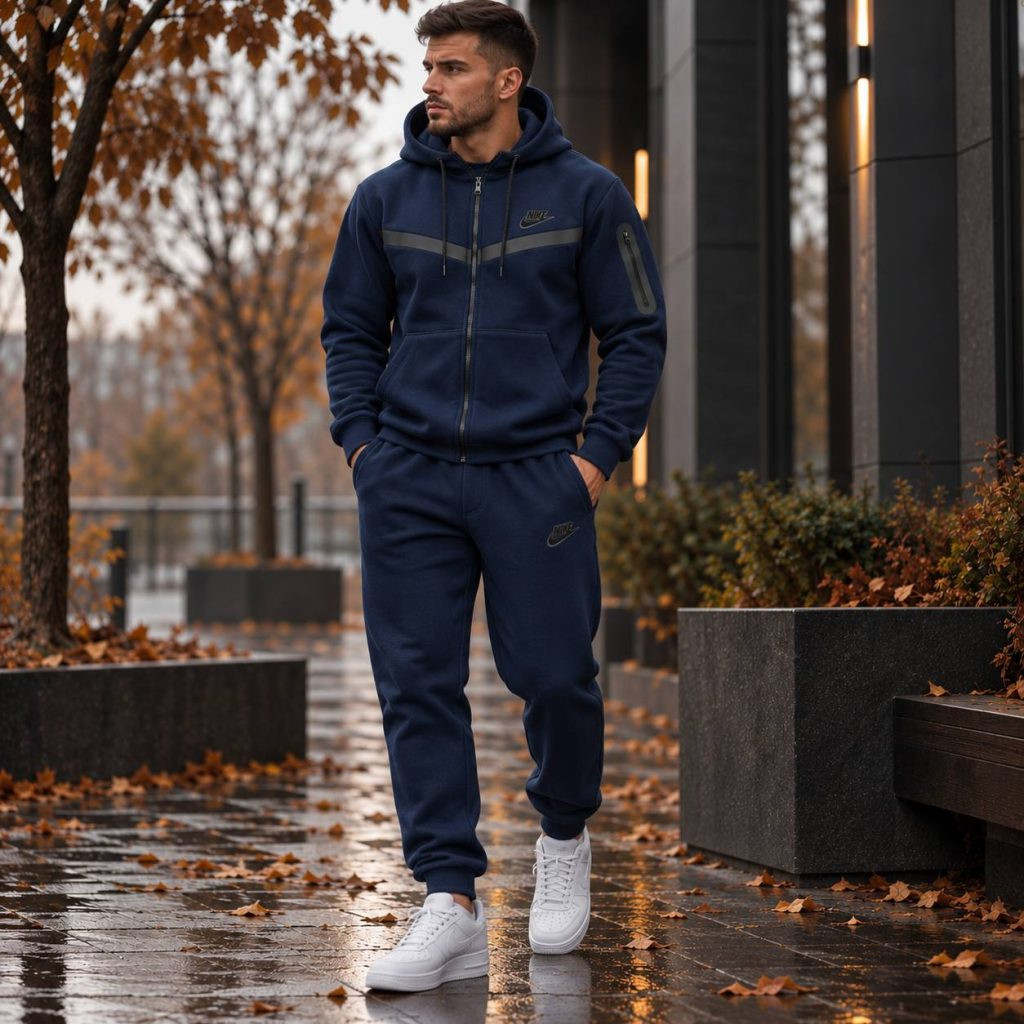 Теплий чоловічий спортивний костюм із двостороннього Polar Fleece темно-сірого кольору, що демонструє м'яку текстуру матеріалу та зручний крій для осінньо-зимового періоду.