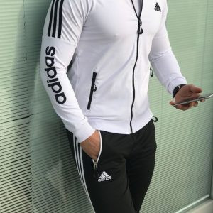 Чоловічий спортивний костюм Active Classic сірого кольору з білими лампасами, вигляд спереду на моделі.